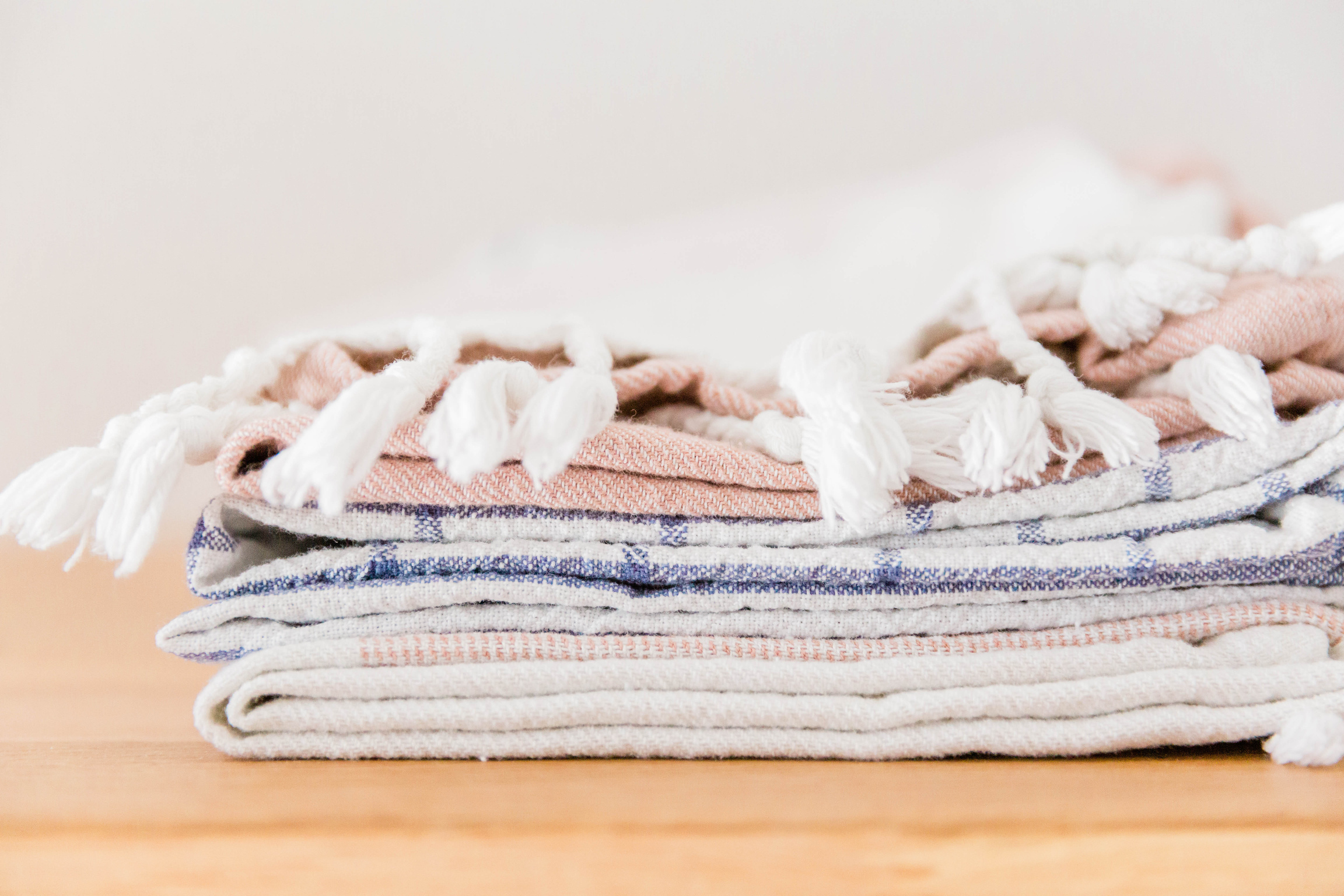Folded Blankets on a Table